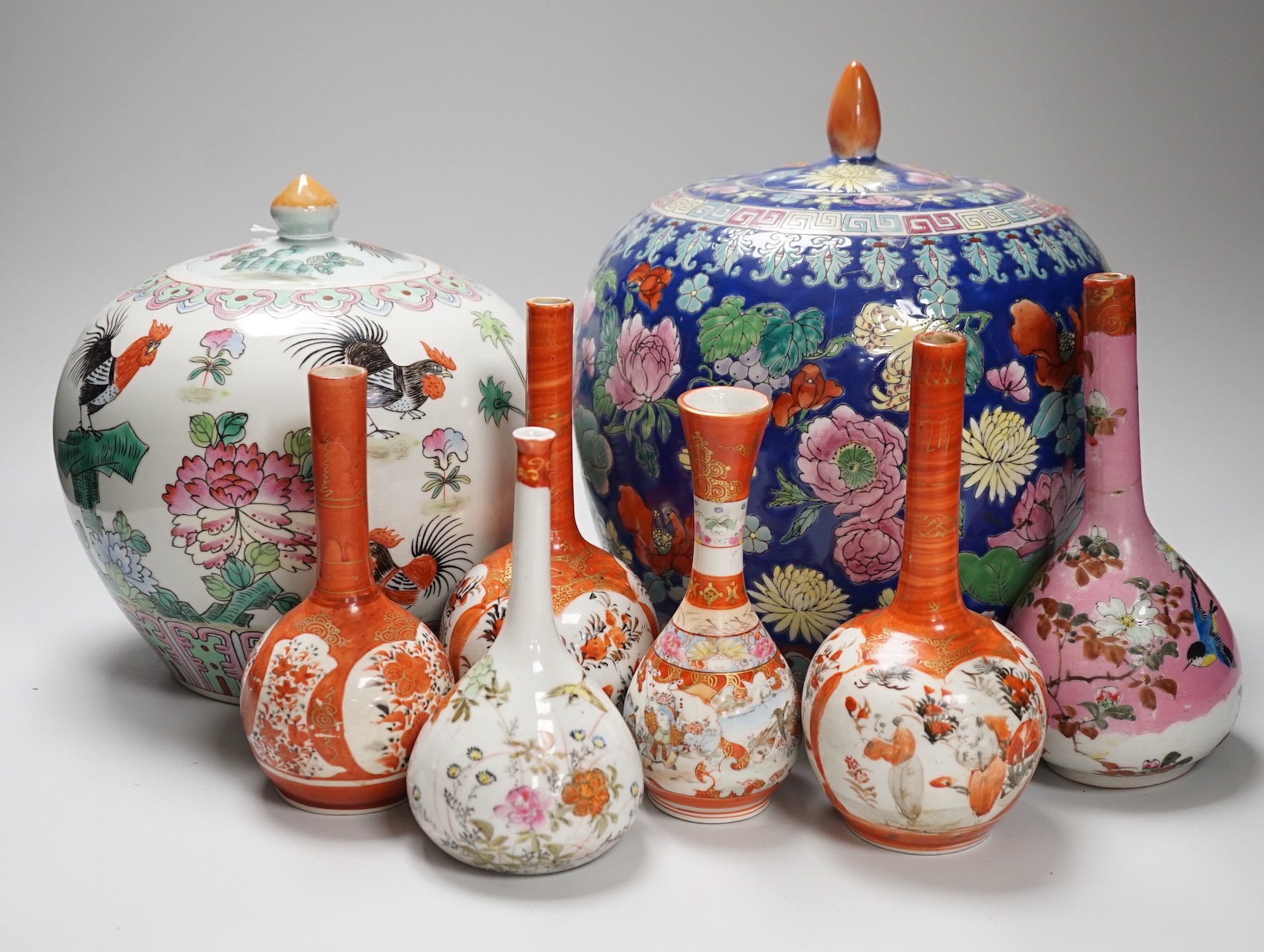 6 Japanese Kutani porcelain bottle vases together with two Chinese famille rose jars and covers, tallest 24cm